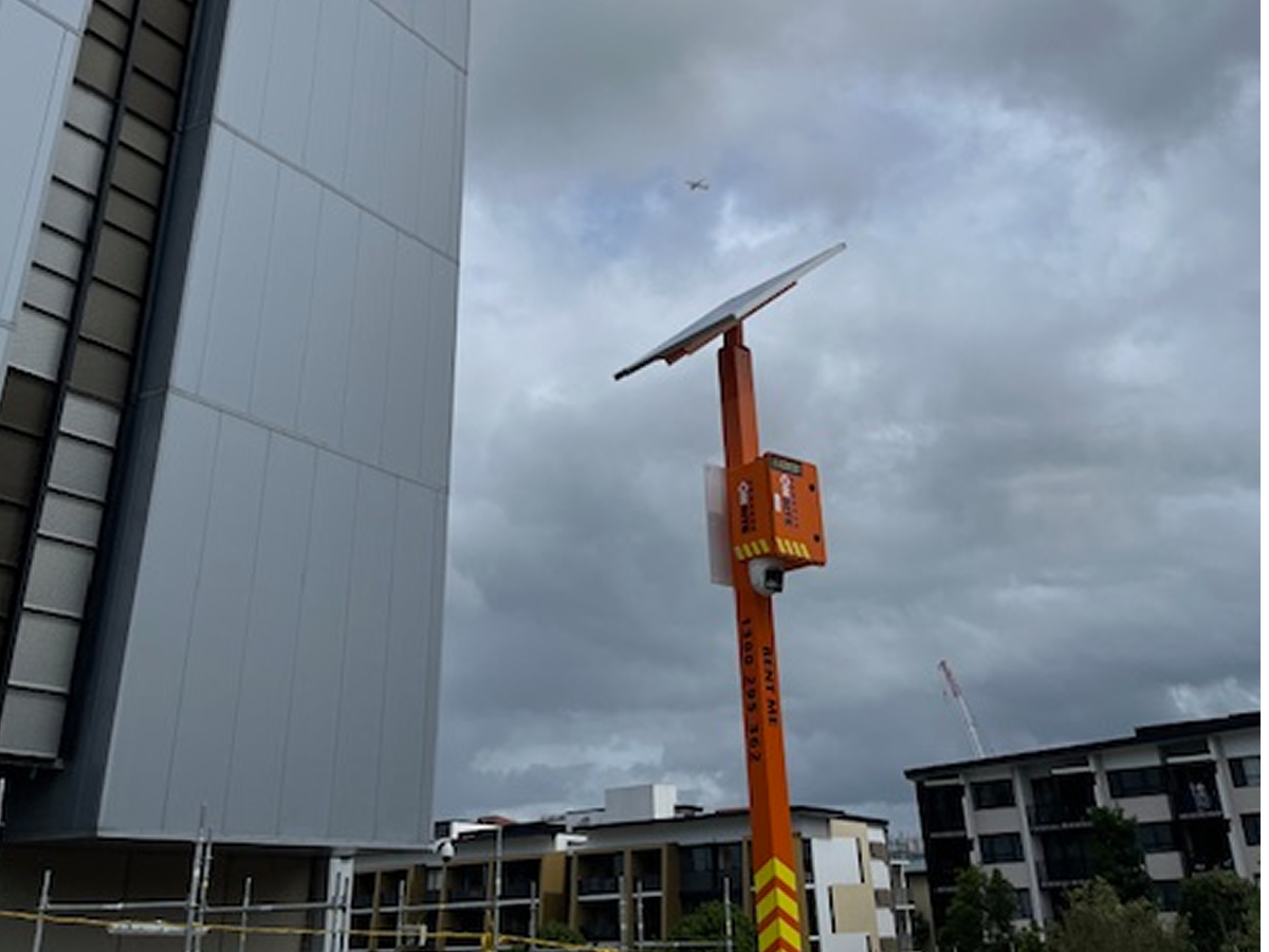 Construction site with Cameras On Site solar powered security camera tower providing clear 24/7 monitoring Australia