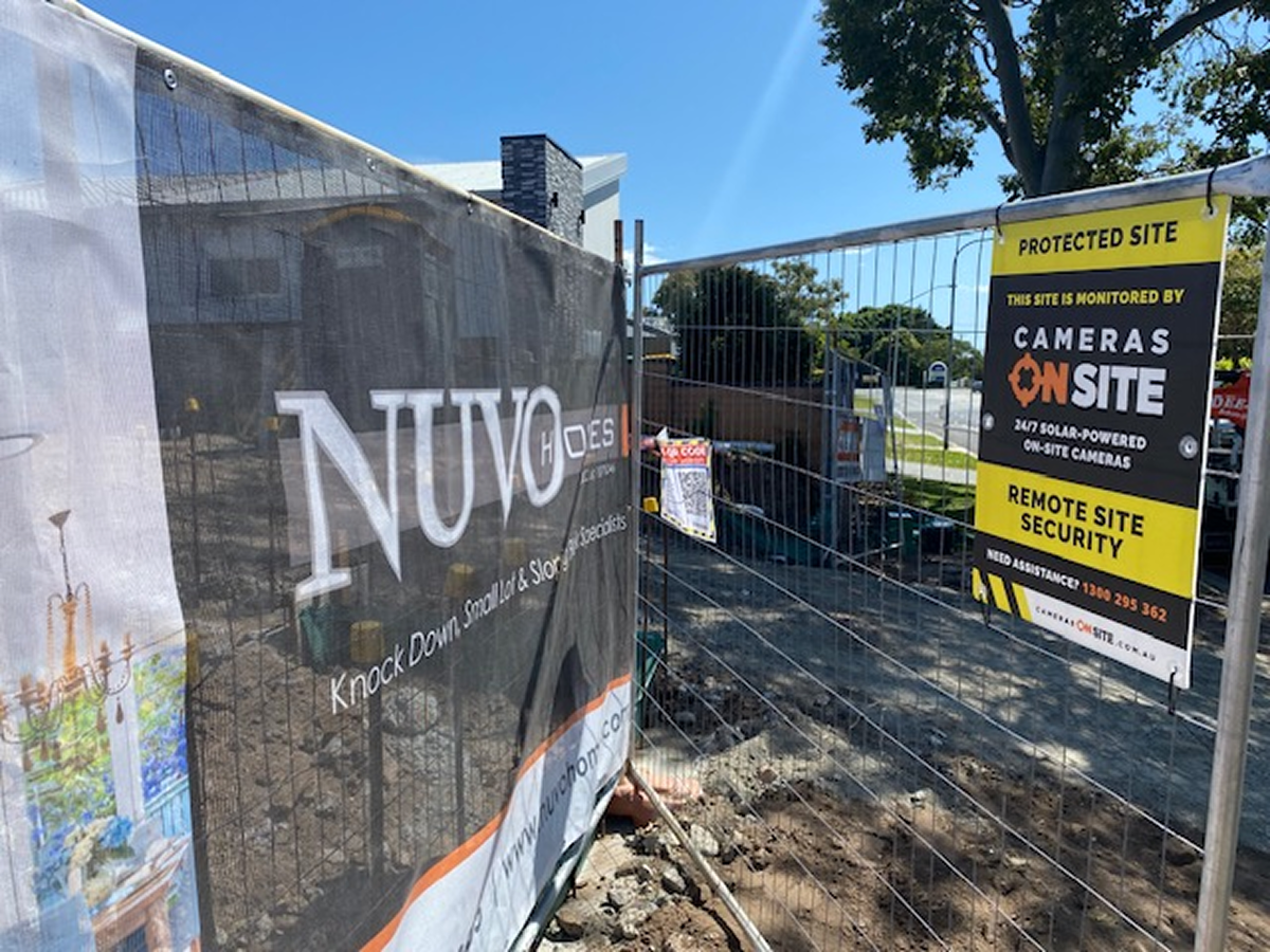 Construction site with Cameras On Site solar powered security camera tower providing 24/7 remote monitoring and protection Australia