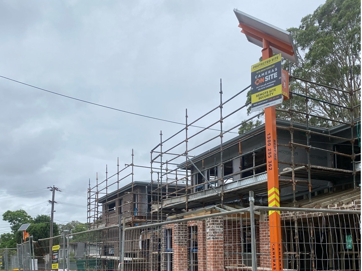 Construction site with Cameras On Site advanced solar powered security camera unit installed for 24/7 monitoring and protection