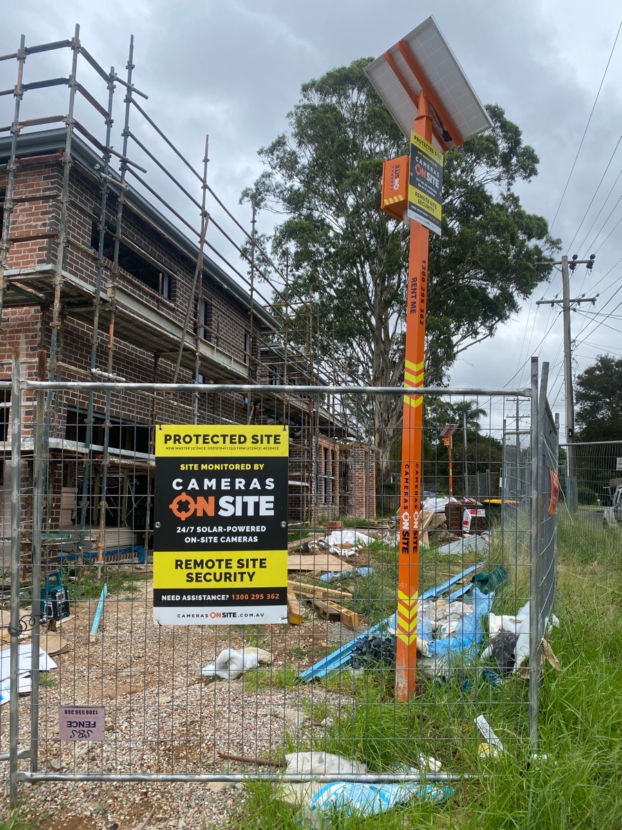 Construction site with Cameras On Site advanced solar powered security camera unit installed for 24/7 monitoring