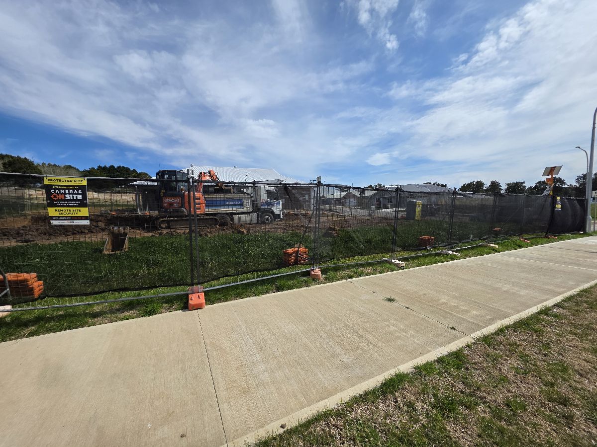 Construction site with Cameras On Site solar powered security camera tower providing clear 24/7 remote monitoring Australia